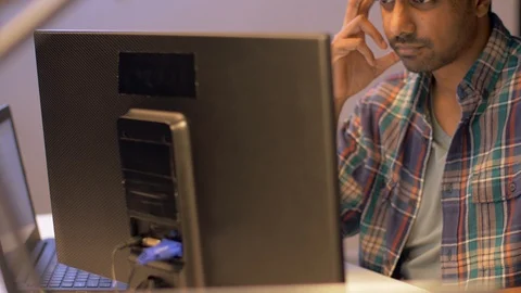 Programmer with computer working at night office Stock-Footage 87121844