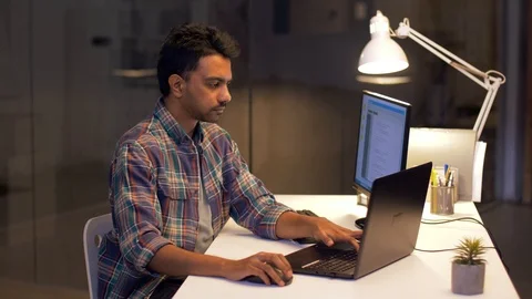 Programmer with computer working at night office 스톡 동영상 88940416