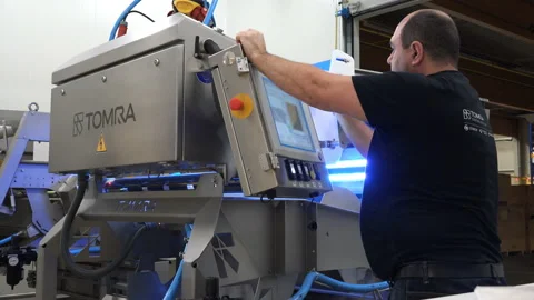 The programmer configures the software of the installation control module Stock Footage 92886766