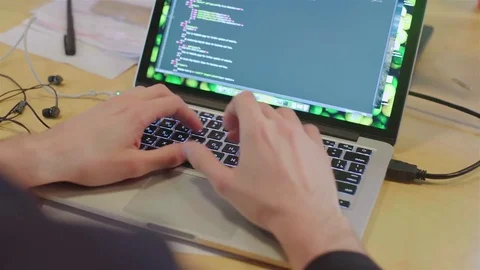 The programmer creates an application for laptop. Stock Footage 71229889