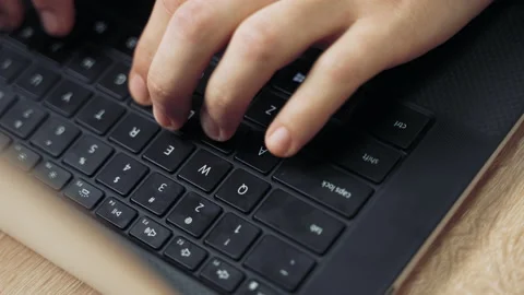 The programmer creates a site and writes code for the program. Video stock 165881033