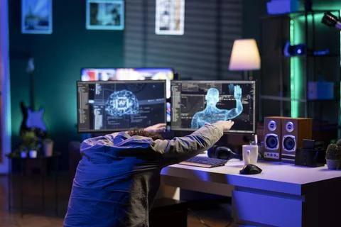 Programmer creating sentient AI, bowing in adulation to new overlord 스톡 사진