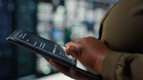 Programmer in data center using tablet to increase workload capacity Stock-Footage 317201785