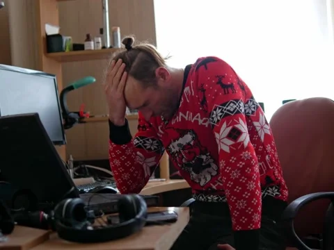 Programmer in despair from failures in the project he smokes an electronic cigar Stock Footage 224138158