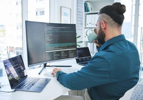 Programmer, developer or man at computer for coding, software script or cyber Stock Photos