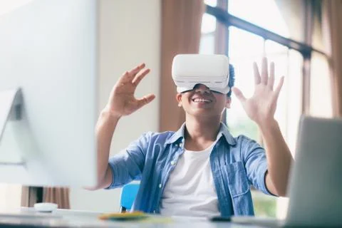 Programmer developer with virtual reality glasses. Stock Photos