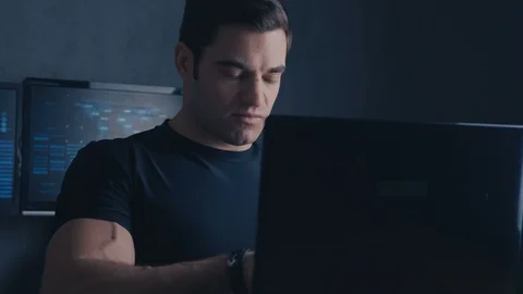 Programmer Developer writes the source code of the software. Male worker Stock Footage 102051671