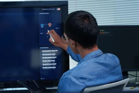 Programmer Developing Artificial Intelligence Software Stock-Fotos
