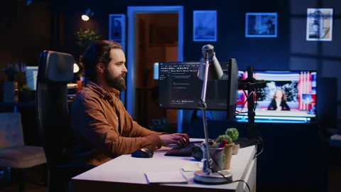 Programmer developing code on computer screen while in personal office Video stock 265508858