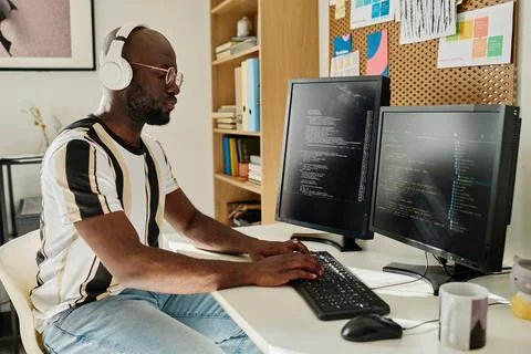 Programmer developing computer codes on computer 스톡 사진