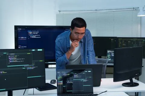 Programmer Developing Digital Software with AI Code Stock Photos