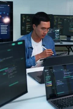 Programmer Developing Digital Software and AI Technology Stock Photos