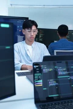Programmer Developing Digital Software and AI Code Foto stock