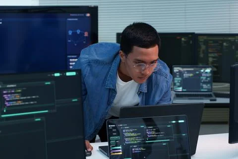 Programmer Developing Digital Software with Code and AI Technology Stock Photos