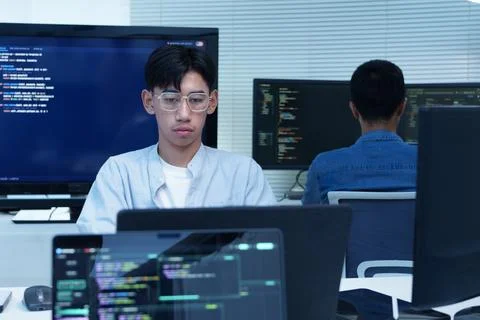 Programmer Developing Digital Software with Code Stock Photos