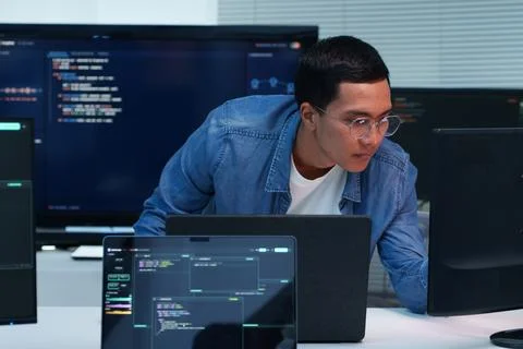 Programmer Developing Digital Software with Code and AI Technology Stock Photos