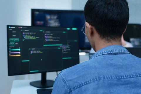 Programmer Developing Software Code and AI Applications Stock Photos