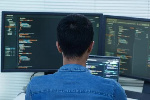 Programmer Developing Software with Code and Digital Technology Stock Photos