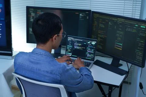 Programmer Developing Software with Code and Digital Technology Stock Photos