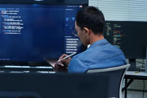 Programmer Developing Software with Code and Digital Technology Stock Photos