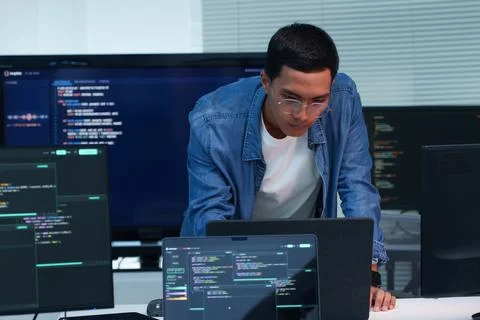Programmer Developing Software with Digital Code Stock Photos