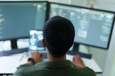 Programmer Developing Software with Multiple Monitors Stock Photos