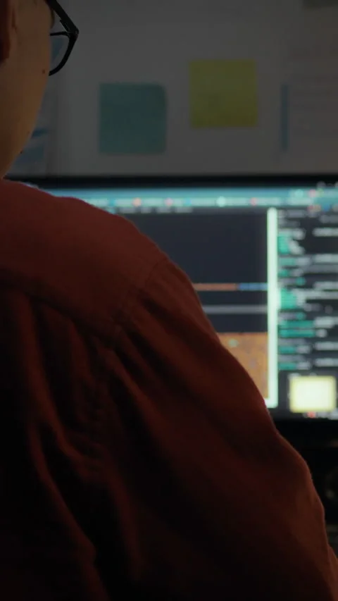 Programmer develops cutting-edge neural program while working late at night 스톡 동영상 331723167