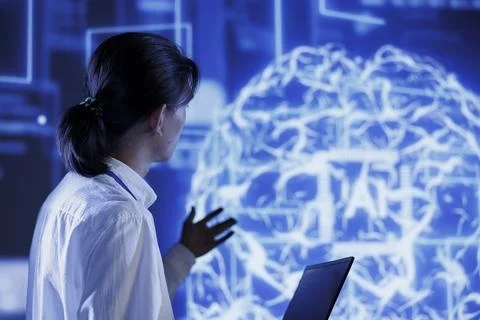 Programmer does AI systems checkup Foto stock