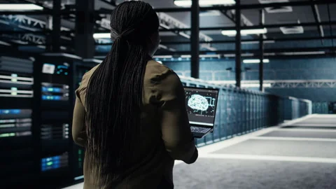 Programmer doing data center automation using AI software tools Stock Footage 317202770