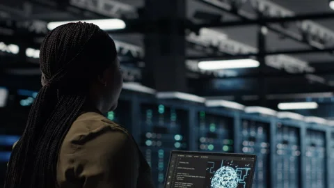 Programmer doing data center automation using AI software tools Stock Footage 317206395