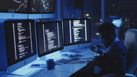 Programmer Eating at Desk at Night Stock Footage 171104993