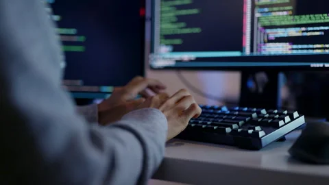 Programmer Engaged in Intense Coding Session at Night.. Stock Footage 273192643