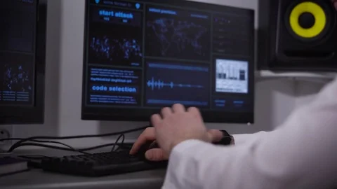 The programmer enters information in a computer class. The man in a light shirt Stock Footage 72447035