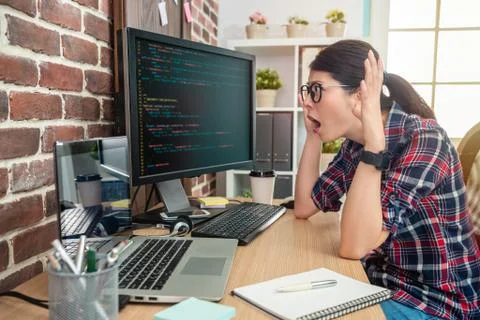 Programmer feeling crazy and overwhelmed Foto stock