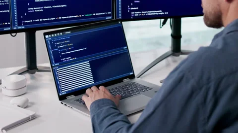 Programmer Focused On Coding New Software Stock Footage 331517308