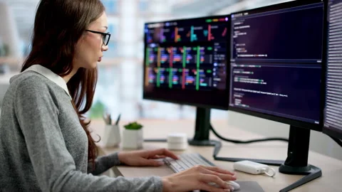 Programmer Focused On Typing Code Quickly Video stock 335879596