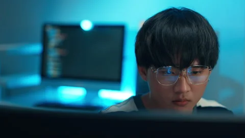 Programmer focusing on screen for debugging logic system task software Stock Footage 313807269