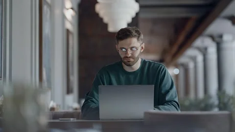 Programmer Freelancer Working With Laptop In Restaurant, Online Job Out Of Video stock 343409708