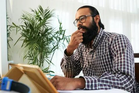 Programmer in front of computer Stock Photos