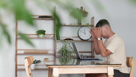 Programmer grabs his head in despair. Stock Footage 310991094