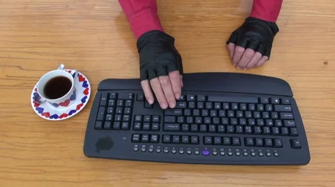 Programmer hacker  hands working on  keyboard and morning coffe cup Video stock 40226586