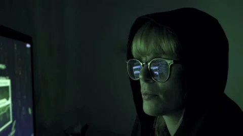Programmer hacker working on computer. Code is reflected on his eye glasses Stock Footage 150423857