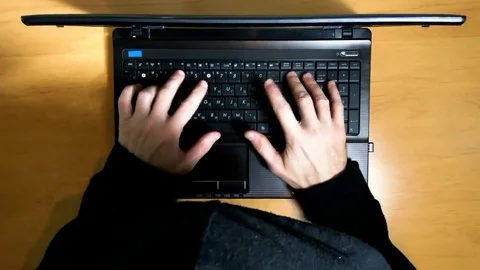 Programmer hacker working on laptop at Desk Stock-Footage 69218493