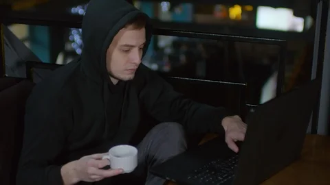 Programmer Hacking and Drinking Tea Stock Footage 105291962
