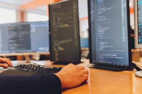 Programmer Hand Faster typing on keyboard. Programmer coding program and website Stock Photos