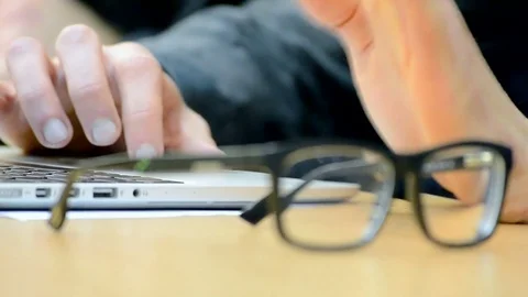 Programmer hands, computer and glasses. Stock Footage 71010476