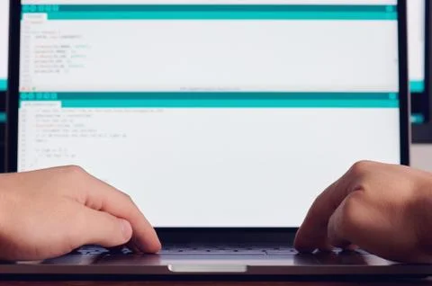 Programmer hands making codes Stock Photos