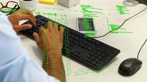 Programmer hands starting on keys, typing code on wired keyboard while green Stock Footage 333648635