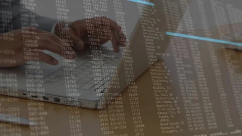 Programmer hands tapping laptop keys and initiating code overlay visualizing Stock Footage 310282957
