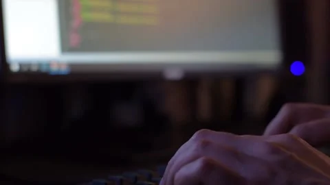 Programmer hands typing quickly, coding. Static, shallow focus, close up Stock Footage 140701737